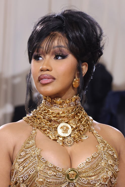 Cardi B updo with bangs