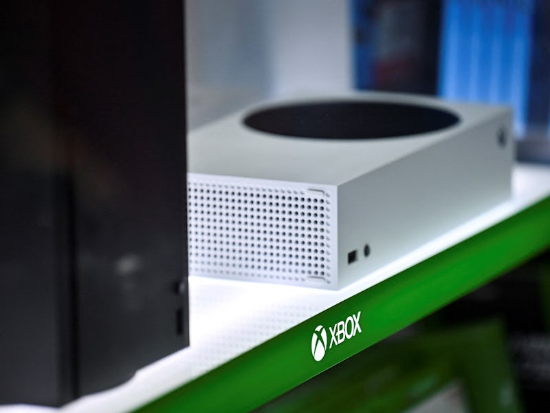 Microsoft's Xbox Series X (L, in black) and series S (R, in white) gaming consoles are seen on displ...