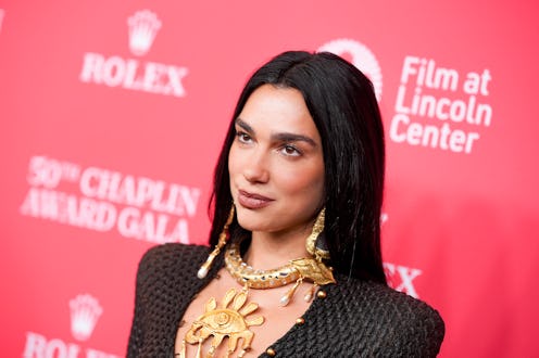 Dua Lipa wore a sheer skirt and leather minidress.