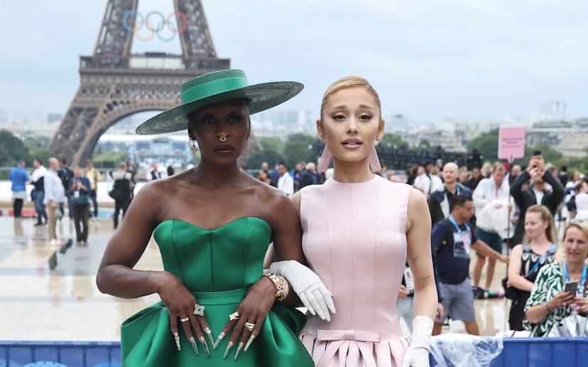 US actor and singer Cynthia Erivo (L) and US snger Ariana Grande (R) pose for a photo on the red car...